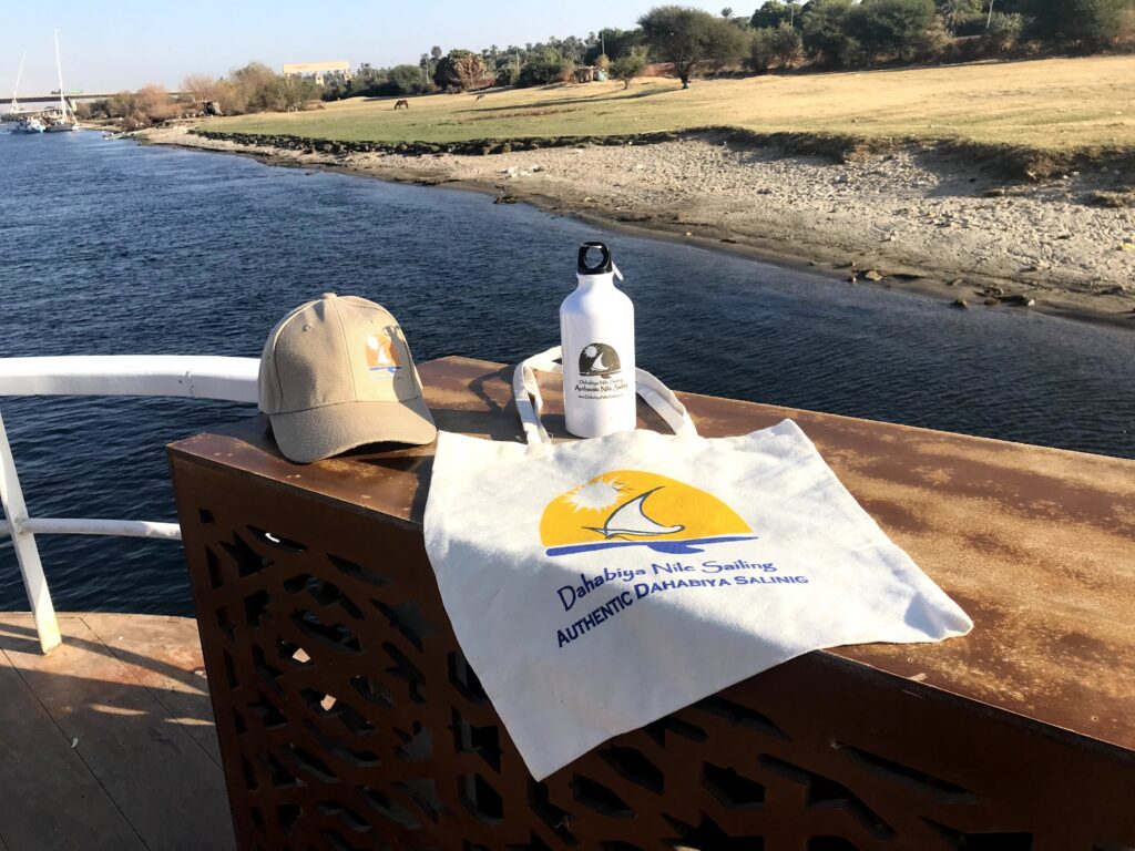 eco bag, eco bottle, and a cap on the dahabiya while sailing to Aswan﻿