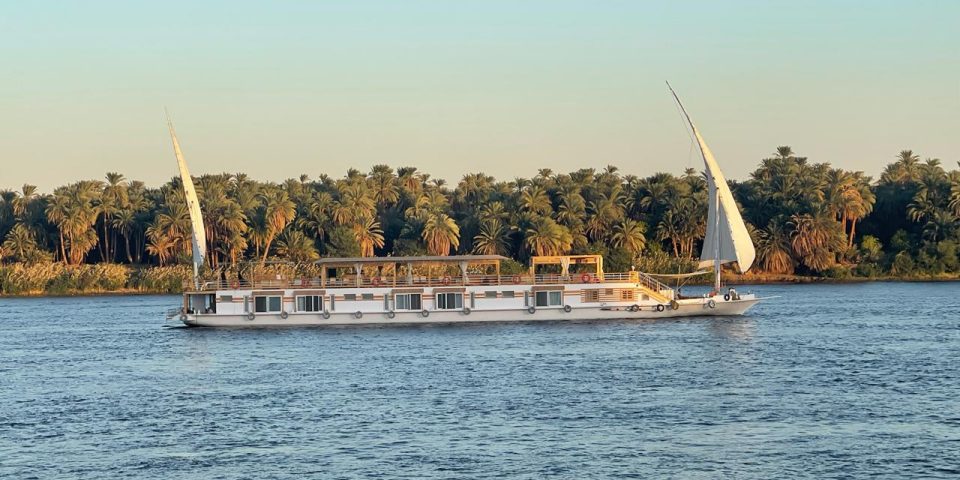 The dahabiya Safiya sailing peacefully along the Nile River in Aswan